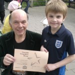 1st Prize winner Nicholas with FromeFM Station Manager Phil Moakes at the FromeFM fun day